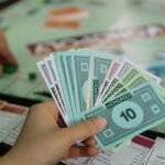 comparação de sistemas monetários em jogos